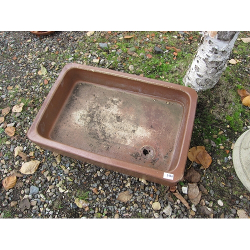 3456 - A stone glazed shallow sink