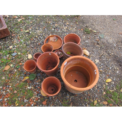 3457 - A quantity of mixed terracotta pots including trays