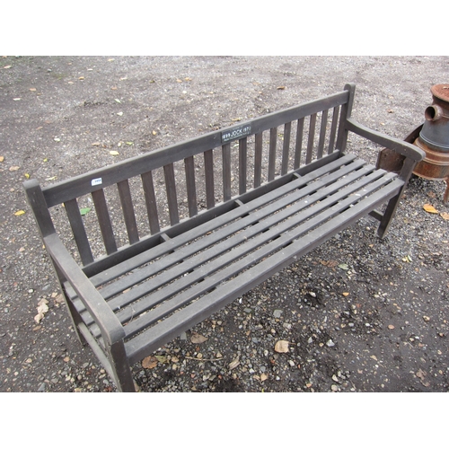 3458 - A hardwood garden bench