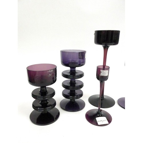 7274 - A collection of Wedgwood amethyst candlesticks by Ronald Sennett-Willson. Three and Two ring Shering... 