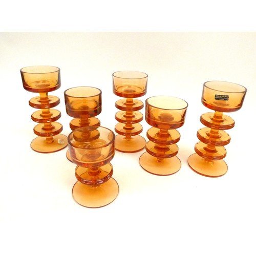 7276 - Six Wedgwood Sheringham candlesticks by Ronald Sennett-Willson in amber. One, two and three ring exa... 