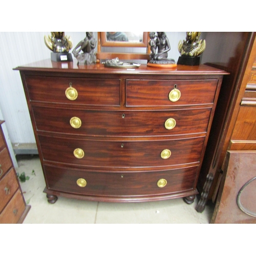 2140 - A Victorian polished mahogany two over three bowfronted chest of drawers with brass pull handles