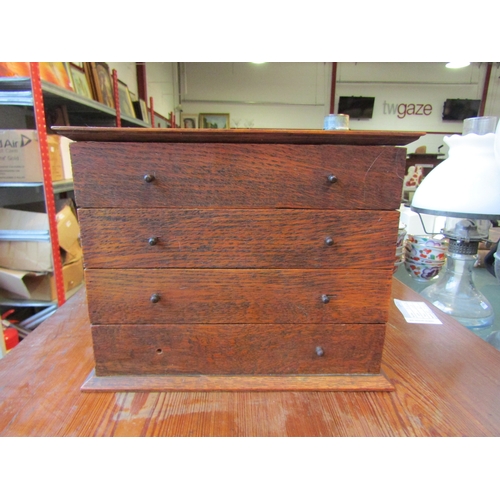 1001 - A small cantilever oak box with lid to top, 19.5cm tall