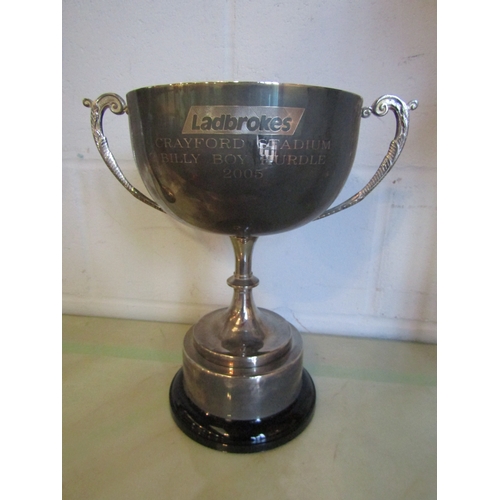 1019 - A large silver plated greyhound racing cup 