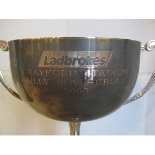 1019 - A large silver plated greyhound racing cup 