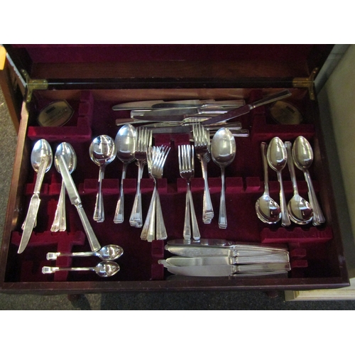 1023 - A Viner's silver plated part canteen of cutlery on raised pad foot legs