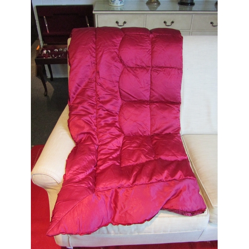 1024 - An early-mid 20th Century cerise coloured eiderdown