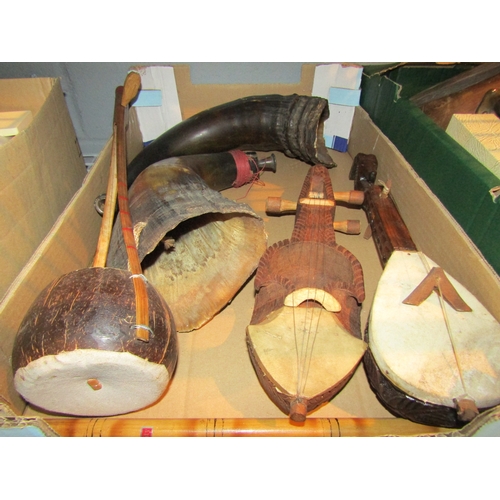 1070 - A group of various instruments including a lute, horns, kalimba, etc.