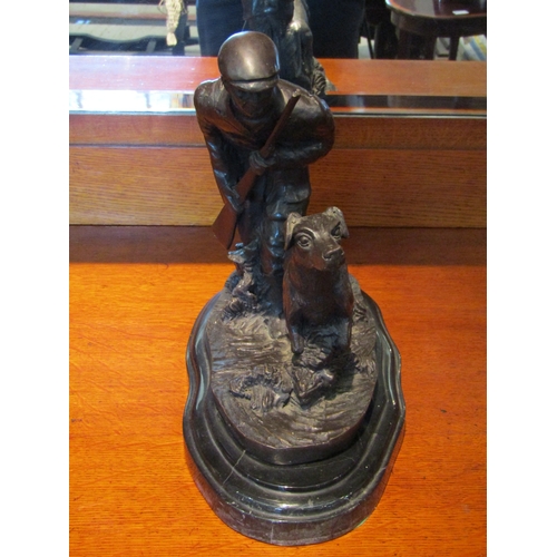 1082 - A hollow cast bronze study of a hunter with a shotgun and retriever after Pierre Jules Mene raised o... 