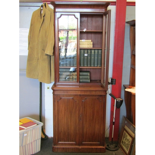 1089 - A late Victorian mahogany bookcase, glazed top over two cupboard door base, 204cm tall x 76cm wide x... 