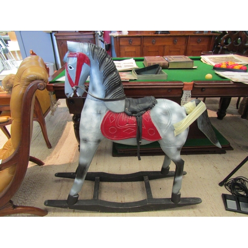 1109 - A carved wooden rocking horse with dappled grey paintwork, on bow rocker, 102cm long x 100cm tall (a... 