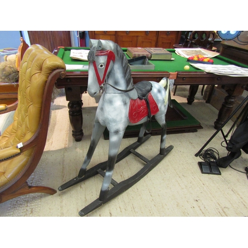 1109 - A carved wooden rocking horse with dappled grey paintwork, on bow rocker, 102cm long x 100cm tall (a... 