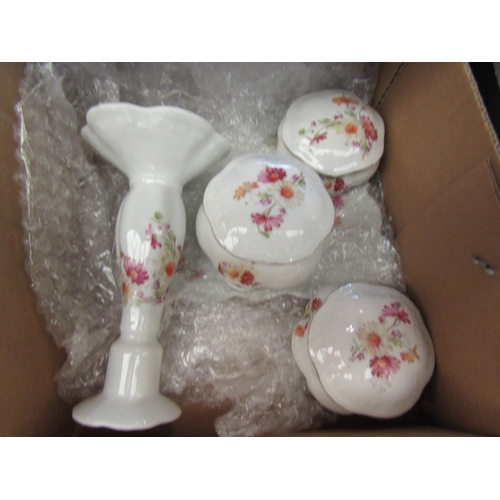 1118 - Two ceramic dressing table sets, floral design