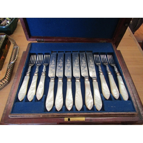 1129 - Two canteens of plated cutlery including example with mother-of-pearl handles, case a/f (2)