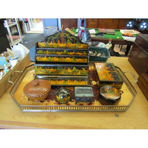 1130 - A dressing table tray and trinkets including a set of lacquered desk items with animal design