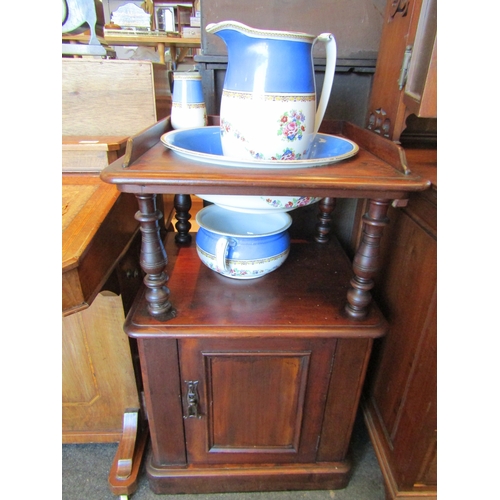 1155 - A Victorian mahogany washstand, 84cm tall x 51cm wide x 46cm deep, with jug and bowl set