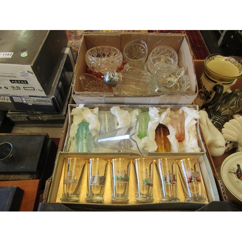 1161 - A box of assorted glassware including medical measure, drinking glass sets etc.