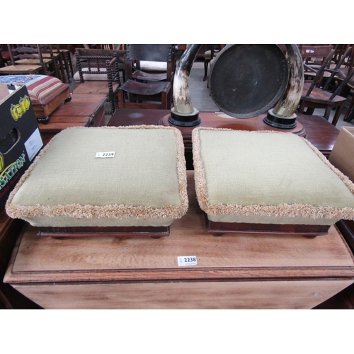 2158 - A pair of Victorian mahogany footstools with brass lion head handles