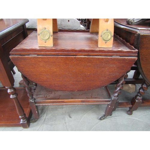 2193 - A 1920's oak barley-twist tea trolley