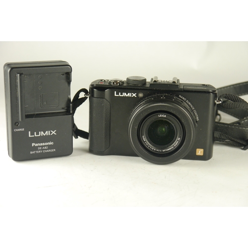 6029 - A Panasonic Lumix DMC-LX7 10.1 MP Digital Camera w/ a Panasonic DE-A82 battery charger