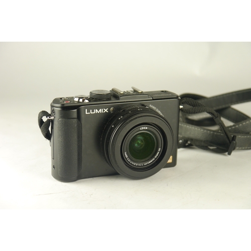 6029 - A Panasonic Lumix DMC-LX7 10.1 MP Digital Camera w/ a Panasonic DE-A82 battery charger