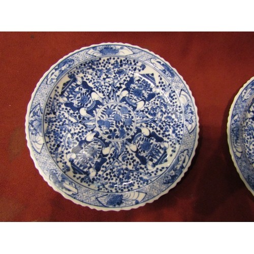 4424 - A pair of Chinese blue and white plates with Yu mark to base in double circle mark, possibly Kangxi ... 