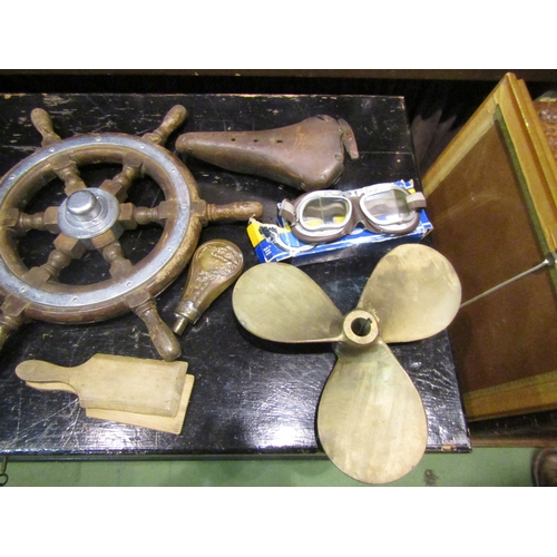 4246 - A box of miscellaneous including a brass propeller, ships wheel, two bicycle seats, walking sticks, ... 