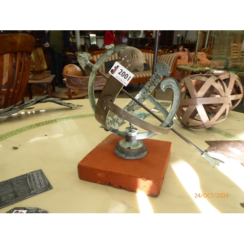 2001 - A decorative bronze armillary sphere on square terracotta base