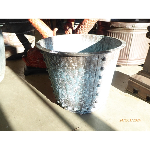 2010 - A verdegris finish metal log bin/planter, 50cm diameter