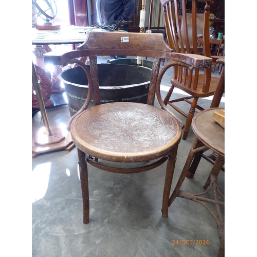 2018 - A 1920's bentwood elbow chair with paint traces