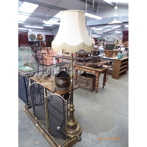 2023 - A Victorian brass lounge standard lamp with shade