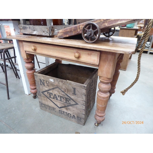 2037 - A Victorian pine single drawer kitchen table on castors 70cm x 110cm