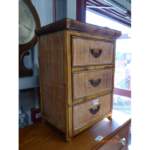 2092 - A small bamboo chest of three drawers