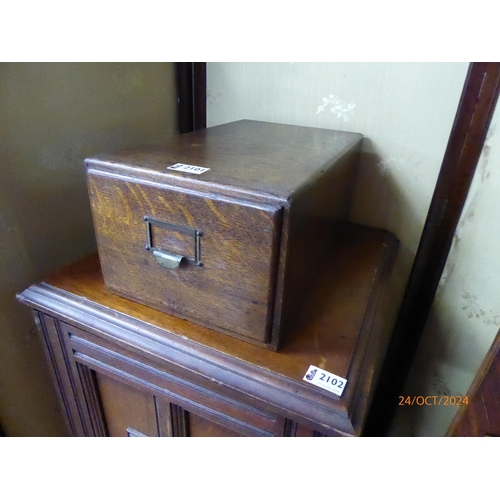 2101 - A 1930s oak framed mirror and card file