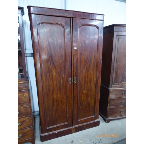 2104 - A Victorian mahogany two door wardrobe