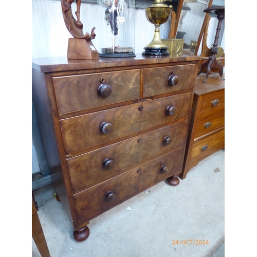 2126 - A 19th Century mahogany two over three chest of drawers on turned feet