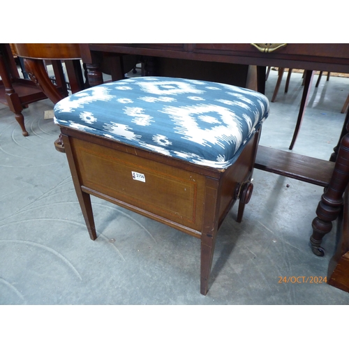 2156 - A Edwardian mahogany inlaid music stool