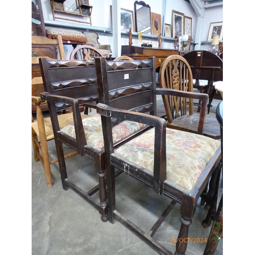 2167 - A pair of 1930s oak elbow chairs