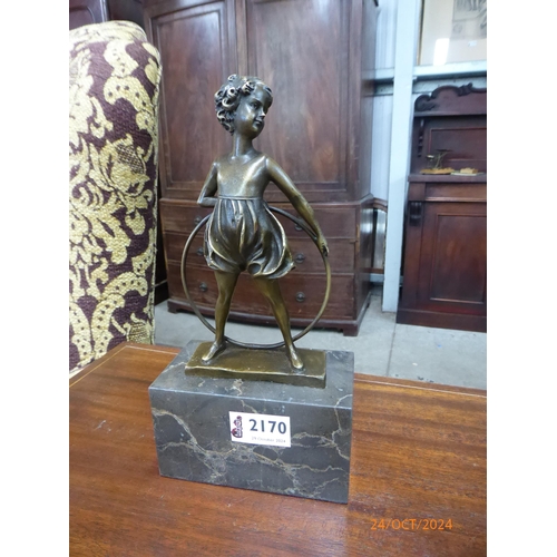 2170 - An Art Deco style bronze statue of a girl with hoop and stick on marble plinth after Priess