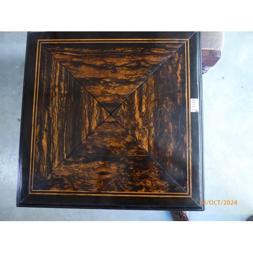 2180 - A 19th Century ebony and coramandel envelope games table