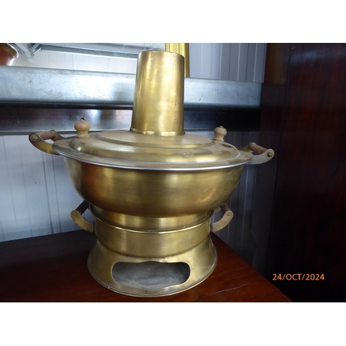 2199 - A pair of oriental brass table cookers