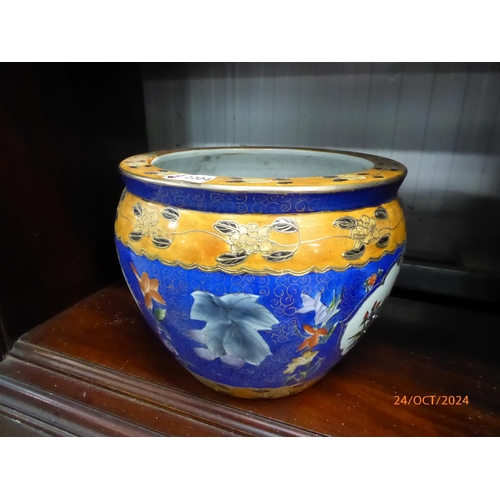 2204 - An Oriental jardinere pot, pheasant design