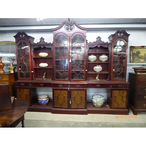 2205 - An extremely large 20th Century reproduction mahogany breakfront bookcase in the 18th Century style,... 