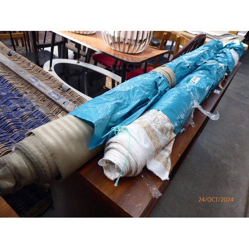 2418 - Two rolls of curtain fabric