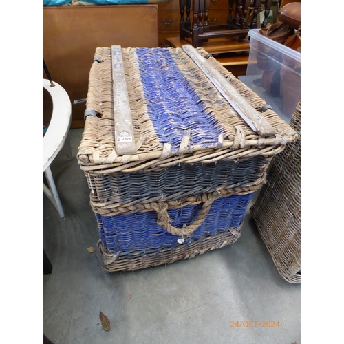 2428 - A large vintage wicker theatre dressing up or clothes basket with iron hinges and castors