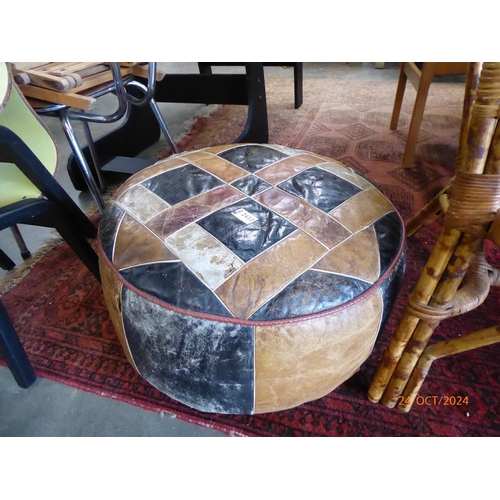 2433 - A Vintage leather pouffe