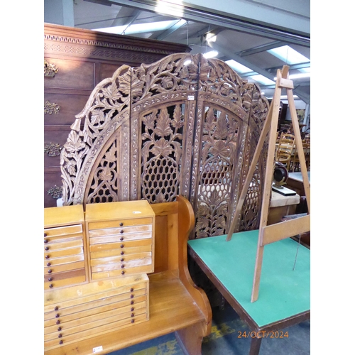 2453 - A carved hardwood screen