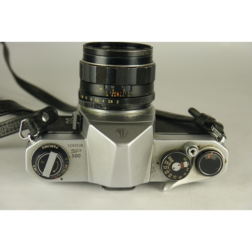 6046 - A cased Pentax SP 500 35mm SLR film camera w/ Two Asahi Opt Co lenses 55mm & 35mm