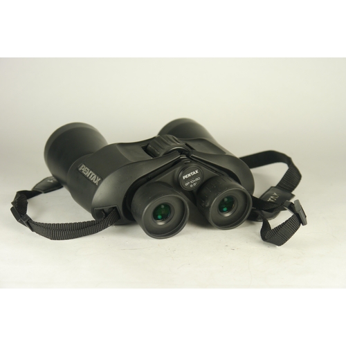 6048 - Seven pairs of mixed Binoculars including a Pentax 10 x 50 SP Porro Prism.