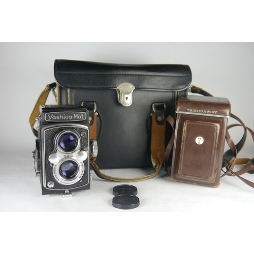 6051 - A cased Yashica-Mat TLR Medium Format Film Camera SR MT4060027 w/80mm lens & accessories